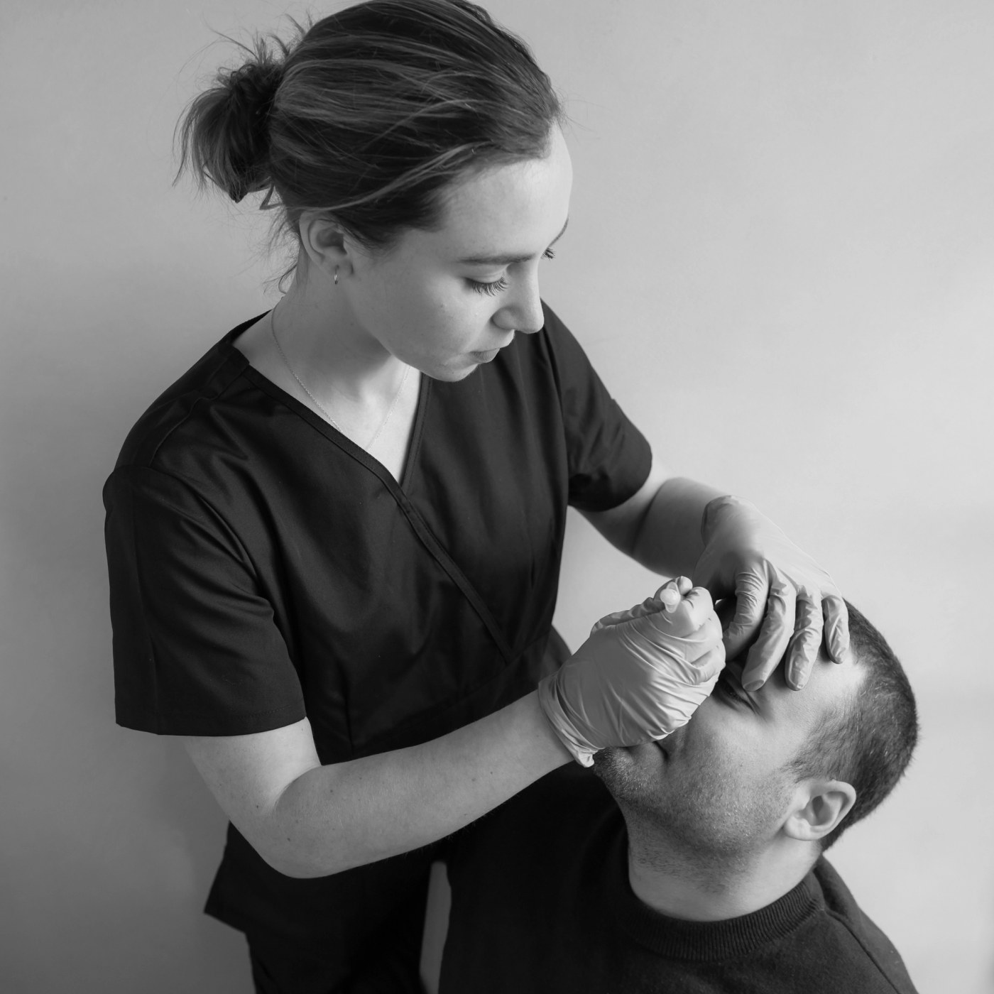 Jenny carrying out a treatment, from her Glowday gallery